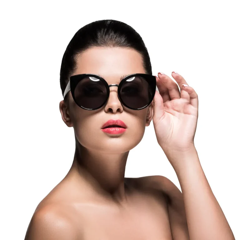 young woman in stylish sunglasses with red lips isolated on white